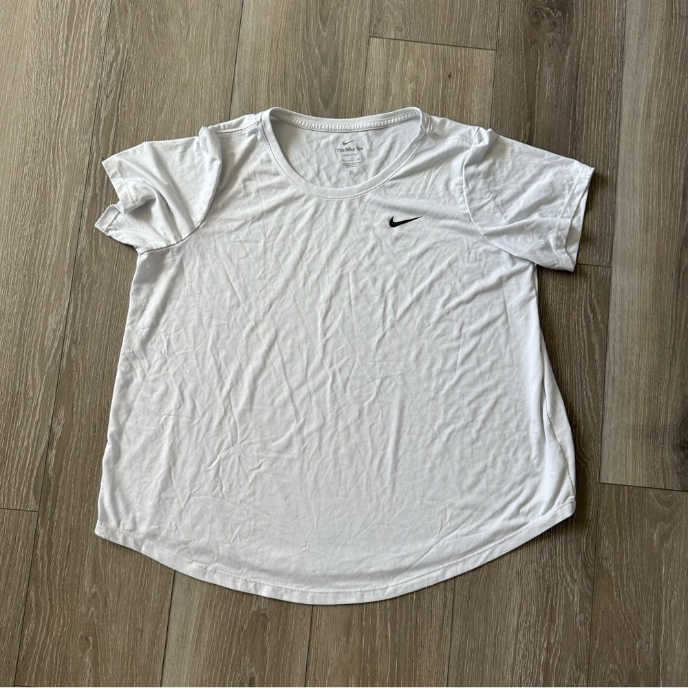 Woman’s Nike White Tee with Black Swoosh